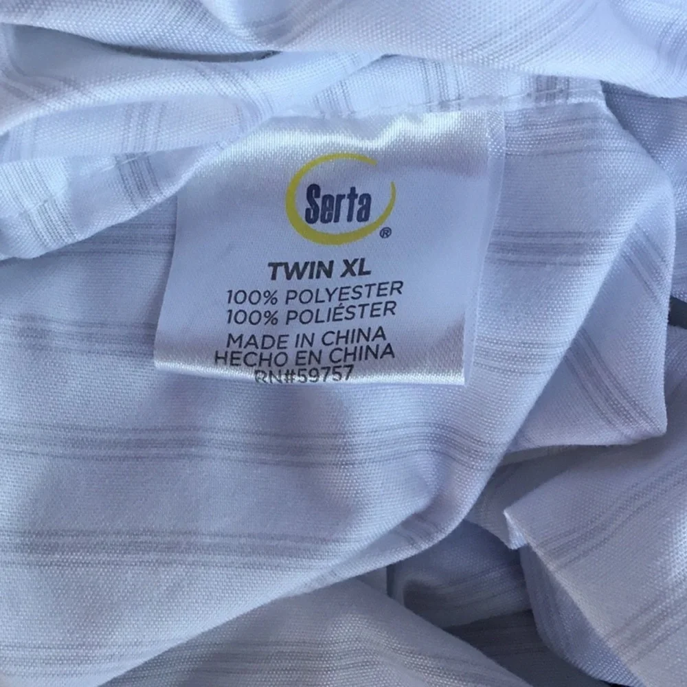 NWOT Serta set of two TXL sheets sets.